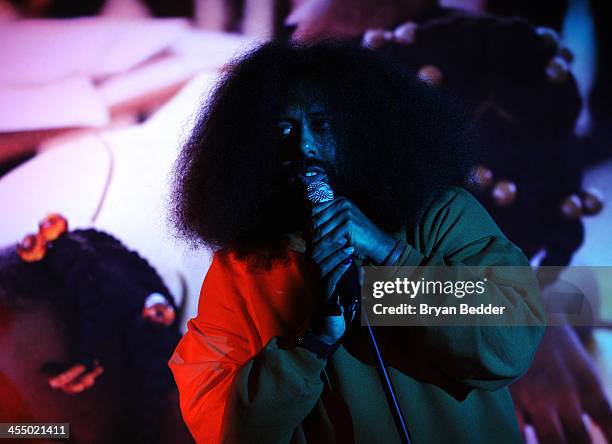 Comedian and Musician Reggie Watts performs onstage at Artists for Peace and Justice NYC Holiday Benefit presented by Bovet 1822 at Up&Down on...