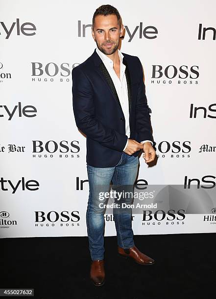 Daniel MacPherson poses during the InStyle and Hugo Boss Men of Style Cocktail Party at Hilton Hotel on September 9, 2014 in Sydney, Australia.