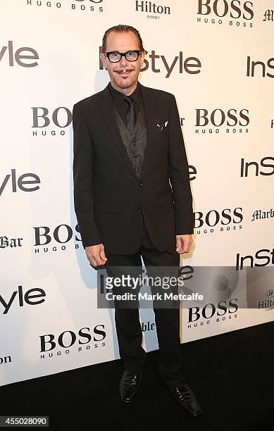 Kirk Pengilly arrives at the InStyle and Hugo Boss Men of Style Cocktail Party at Hilton Hotel on September 9, 2014 in Sydney, Australia.