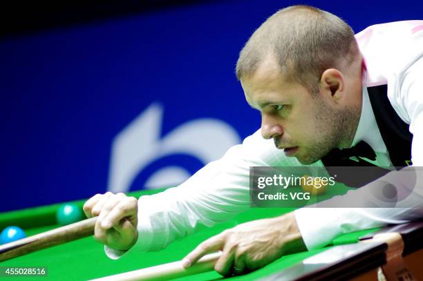 Barry Hawkins of England plays a shot in the match against Mark Williams of Wales during day two of the World Snooker Bank of Communications OTO...