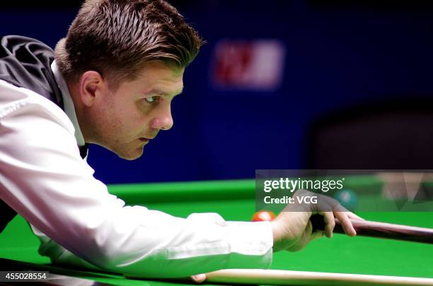 Ryan Day of Wales plays a shot in the match against John Higgins of Scotland during day two of the World Snooker Bank of Communications OTO Shanghai...