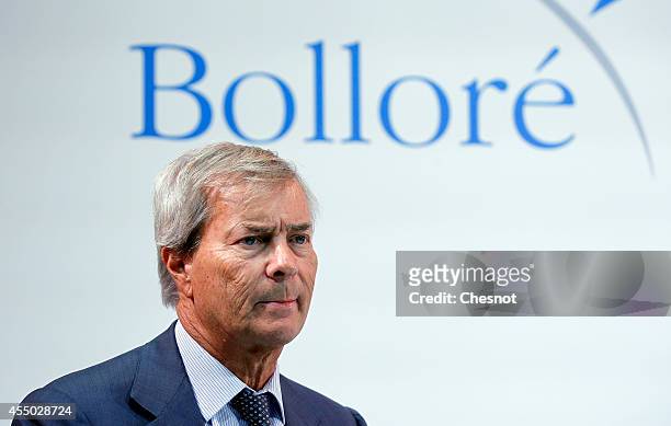 French industrial group Bollore head Vincent Bollore attends a press conference with CEO of French carmaker Renault, Carlos Ghosn at the Atelier...