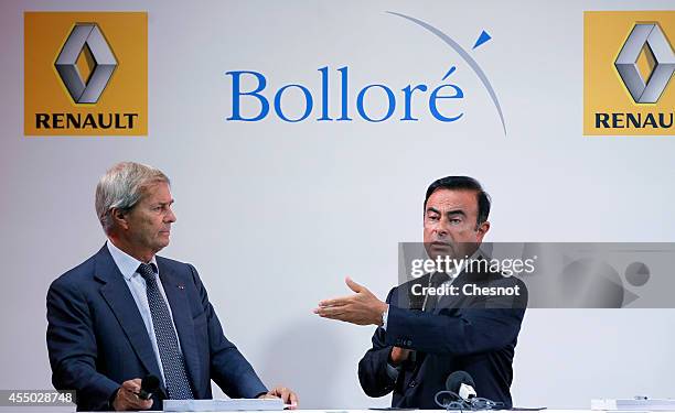 The CEO of French carmaker Renault, Carlos Ghosn and French industrial group Bollore head Vincent Bollore give a press conference at the Atelier...