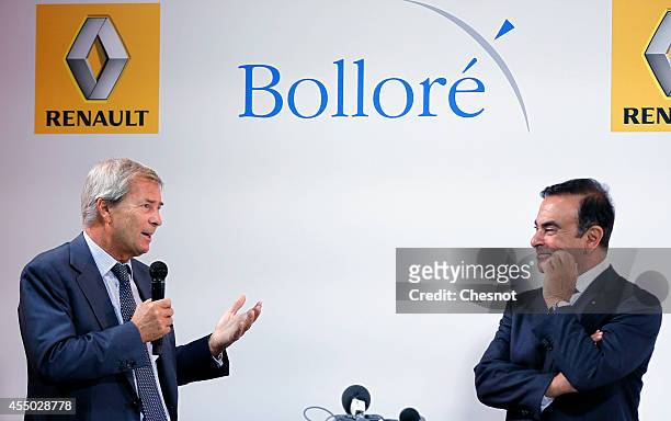 The CEO of French carmaker Renault, Carlos Ghosn and French industrial group Bollore head Vincent Bollore give a press conference at the Atelier...