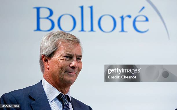 French industrial group Bollore head Vincent Bollore attends a press conference with CEO of French carmaker Renault, Carlos Ghosn at the Atelier...