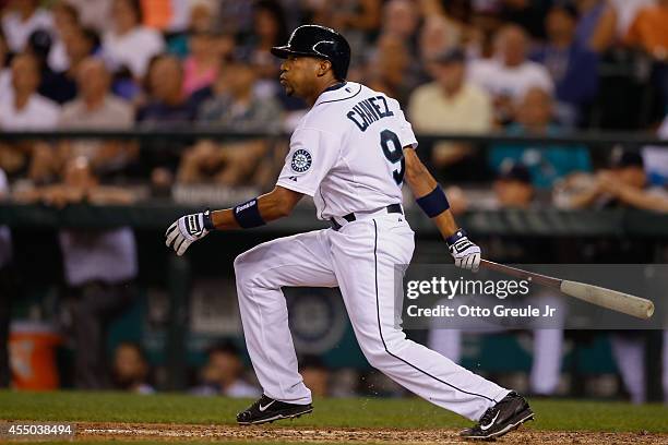 Endy Chavez of the Seattle Mariners hits a two-RBI double in the fourth inning against the Texas Rangers at Safeco Field on August 26, 2014 in...