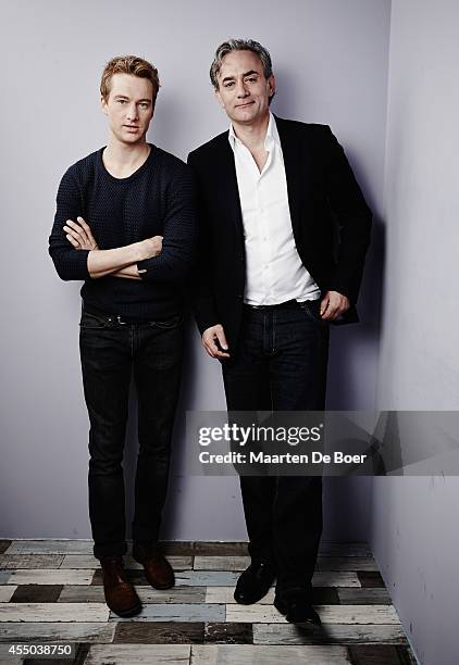 Actor Alexander Fehling and director Giulio Ricciarelli of "Labyrinth of Lies" pose for a portrait during the 2014 Toronto International Film...