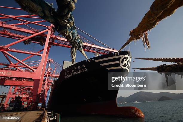 The Hanjin Hamburg cargo ship sits berthed at the Hanjin Shipping Co. Busan New Port terminal in Busan, South Korea, on Tuesday, Dec. 10, 2013. South...