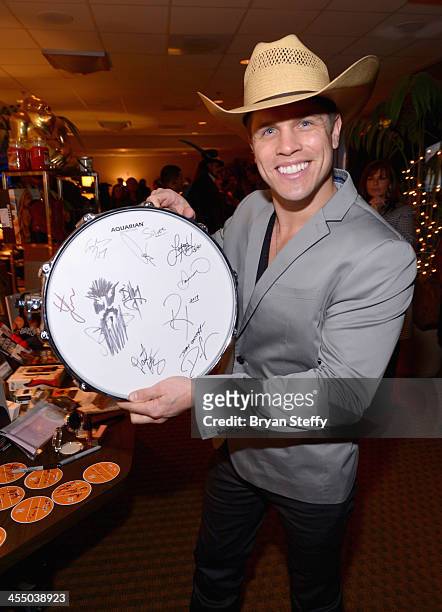 Singer Dustin Lynch attends the Backstage Creations Celebrity Retreat at the American Country Awards 2013 at the Mandalay Bay Events Center on...