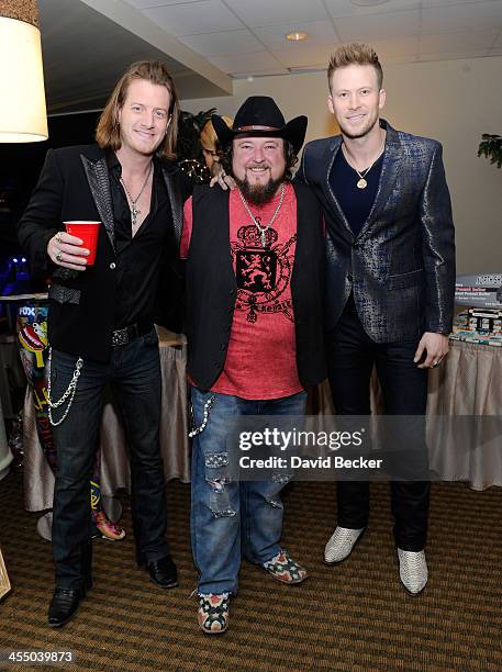 Recording artists Tyler Hubbard of Florida Georgia Line, Colt Ford and Brian Kelley of Florida Georgia Line attends the Backstage Creations Celebrity...