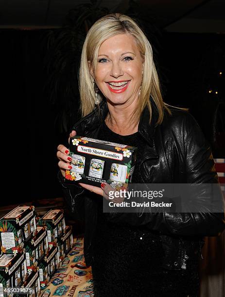 Singer Olivia Newton-John attends the Backstage Creations Celebrity Retreat at the American Country Awards 2013 at the Mandalay Bay Events Center on...