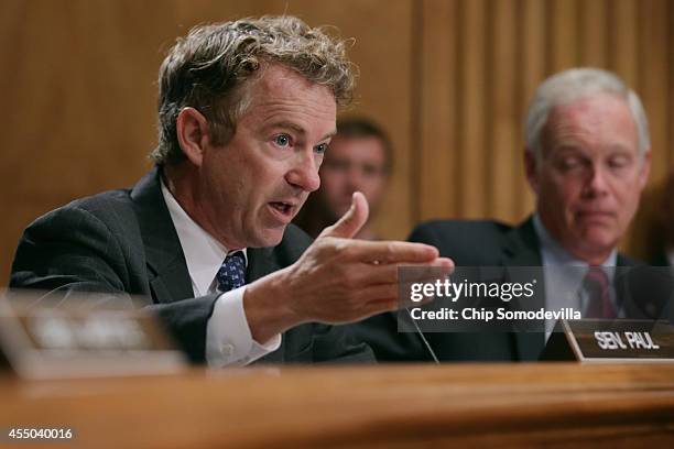 Sen. Rand Paul questions witnesses about military equipment given to local law enforcement departments by the federal government during a Senate...