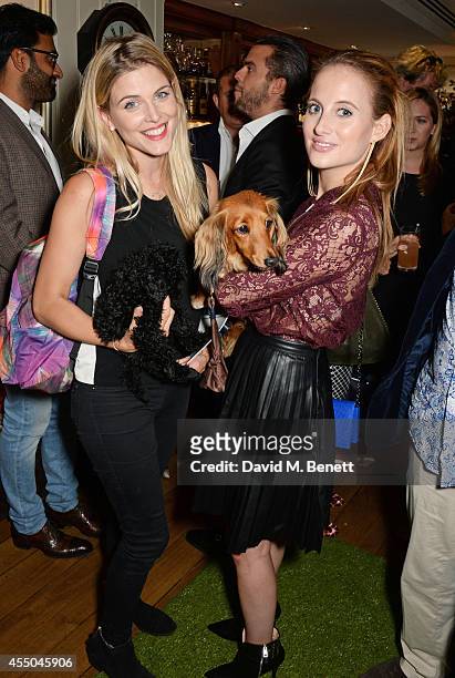 Ashley James and Rosie Fortescue attend Dogs Trust at George on September 9, 2014 in London, England.