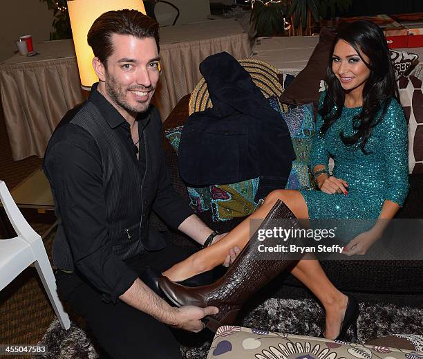 Television personality Jonathan Scott and Kat Kelley attend the Backstage Creations Celebrity Retreat at the American Country Awards 2013 at the...