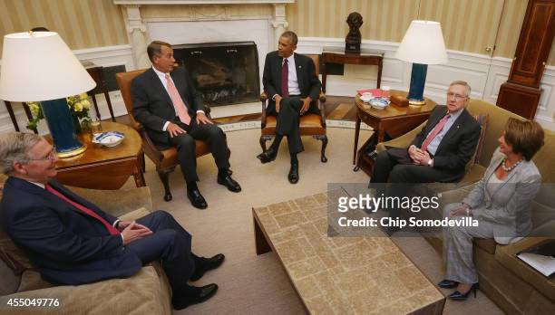 President Barack Obama meets with Senate Minority Leader Mitch McConnell , Speaker of the House John Boehner , Senate Majority Leader Harry Reid and...