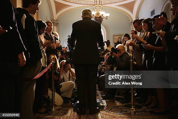 Senate Majority Leader Sen. Harry Reid speaks to members of the media after the Senate Democrats weekly policy luncheon September 9, 2014 on Capitol...