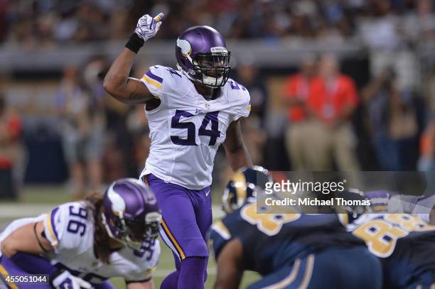 Jasper Brinkley of the Minnesota Vikings prepares for a play against the St. Louis Rams at the Edward Jones Dome on September 7, 2014 in St. Louis,...