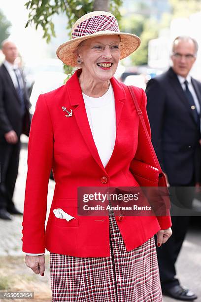 Queen Margrethe II of Denmark smiles upon her arrival to board the remake of a Viking ship on September 9, 2014 in Berlin, Germany. Queen Margrethe...