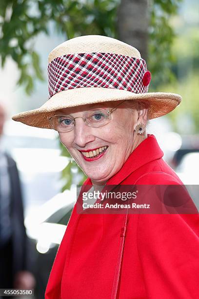 Queen Margrethe II of Denmark smiles upon her arrival to board the remake of a Viking ship on September 9, 2014 in Berlin, Germany. Queen Margrethe...