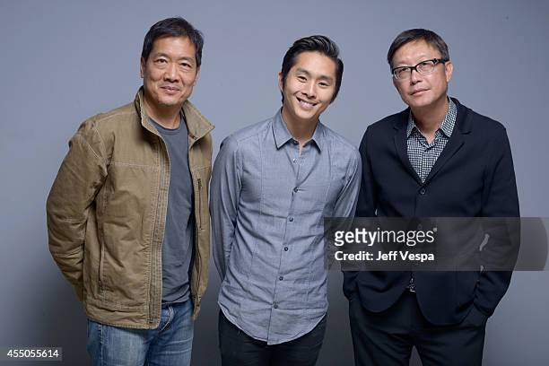 Director Andrew Loo, actor Justin Chon and director Andrew Lau of "Revenge of the Green Dragons" pose for a portrait during the 2014 Toronto...