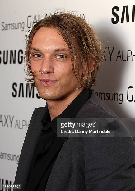 Jamie Campbell Bower attends the Samsung Galaxy Alpha Launch party at The Collection on September 9, 2014 in London, England.