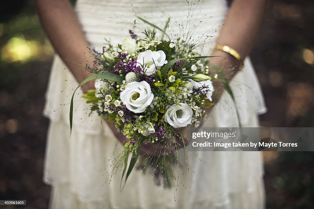 Bride holding wedding bouque