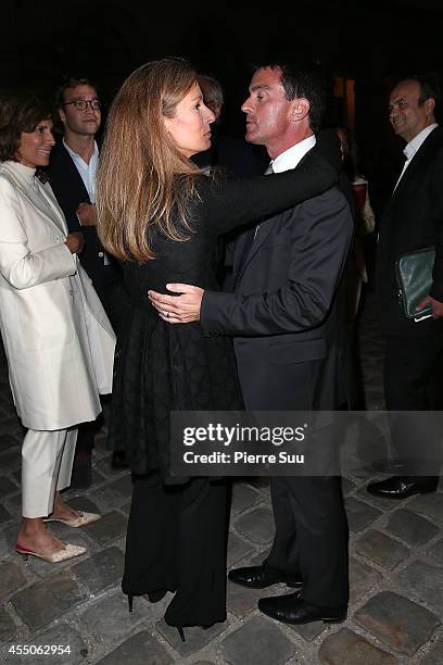 French Prime Minister Manuel Valls and his wife Anne Gravoin attend 'Don Giovanni - Opera En Plein Air' at Hotel Des Invalides on September 9, 2014...