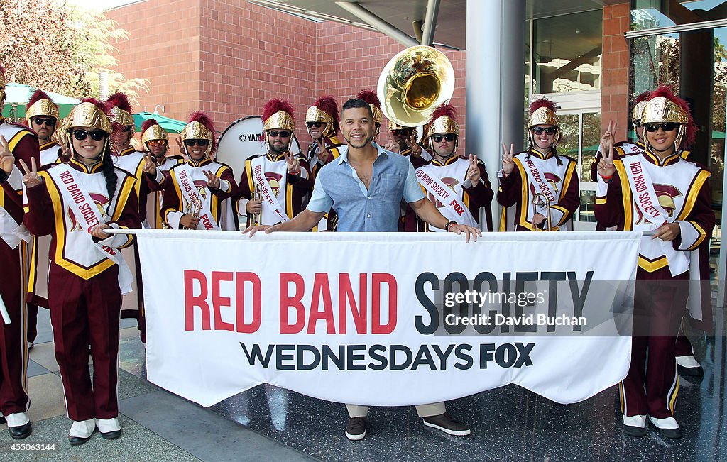 The Cast Of FOX's New Show "Red Band Society" Bands For Good Marching Band Stunt