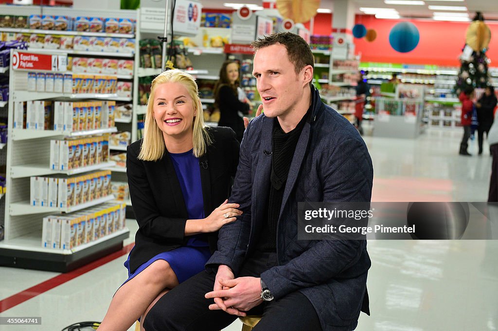 Professional Hockey Player Dion Phaneuf And His Wife  Actress Elisha Cuthbert Make In-Store Holiday Appearance At Target