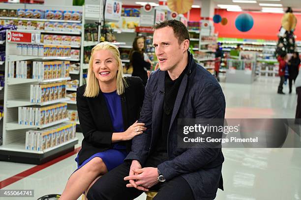 Actress Elisha Cuthbert and her husband professional hockey player Dion Phaneuf make an in-store Holiday appearance at Target at Shoppers World...