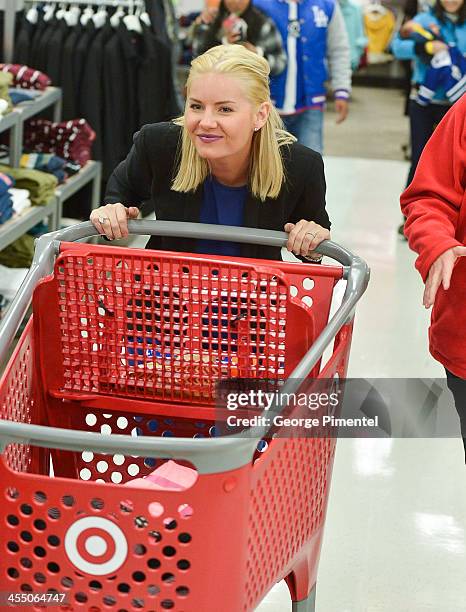 Actress Elisha Cuthbert makes an in-store Holiday appearance at Target at Shoppers World Danforth on December 10, 2013 in Toronto, Canada.