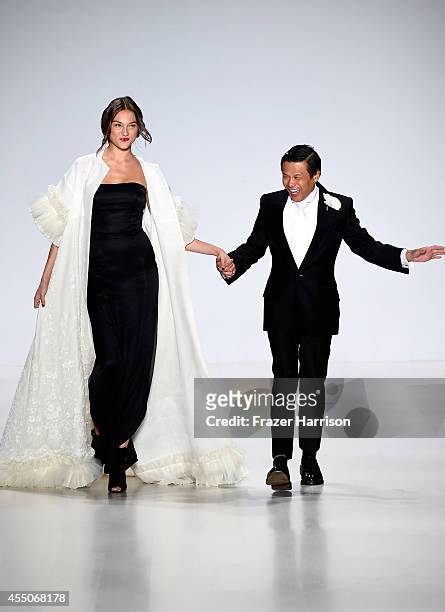 Fashion designer Zang Toi walks the runway at the Zang Toi fashion show during Mercedes-Benz Fashion Week Spring 2015 at The Salon at Lincoln Center...