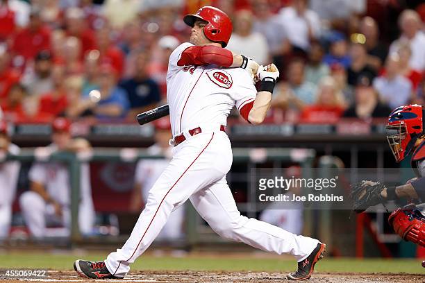 Devin Mesoraco of the Cincinnati Reds bats in the third inning of the game against the St. Louis Cardinals at Great American Ball Park on September...