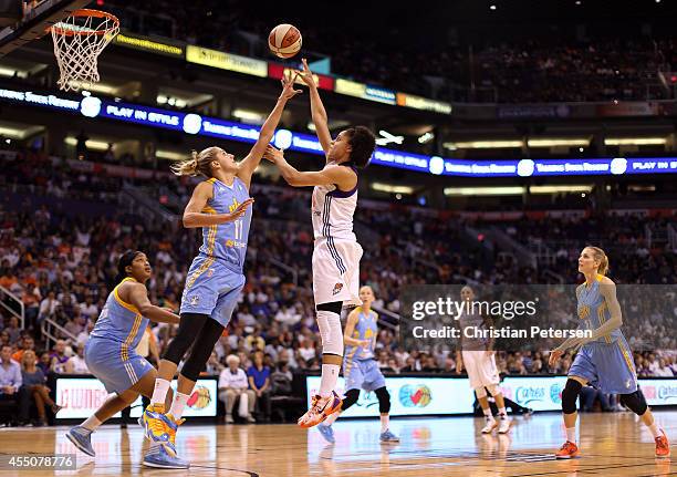 Candice Dupree of the Phoenix Mercury puts up a shot over Elena Delle Donne of the Chicago Sky during the first half of game two of the WNBA Finals...