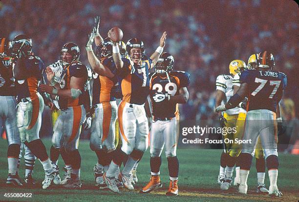 John Elway of the Denver Broncos celebrates defeating the Green Bay Packers in Super Bowl XXXII on January 25, 1998 at Qualcomm Stadium in San Diego,...