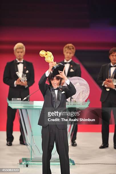 Shunsuke Nakamura of Yokohama F.Marinos is awarded the most valuable player of the season during the 2013 J.League Awards at Yokohama Arena on...