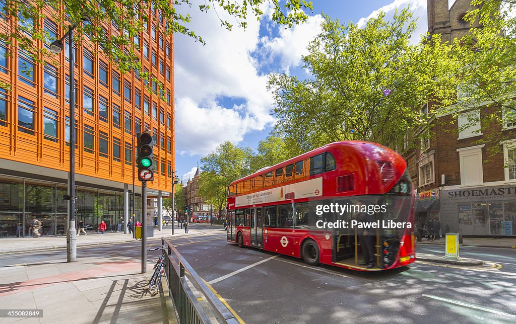 New doubledecker Routemaster bus passing by Central Saint...