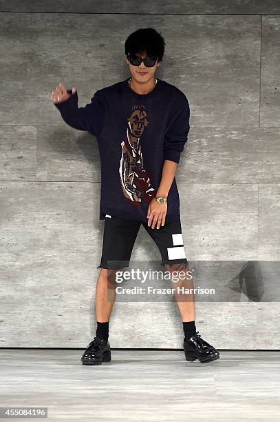 Designer Taeyong Ko of Beyond Closet walks the runway at the Concept Korea fashion show during Mercedes-Benz Fashion Week Spring 2015 at The Pavilion...