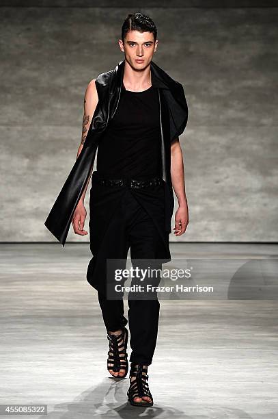 Model walks the runway wearing Resurrection at the Concept Korea fashion show during Mercedes-Benz Fashion Week Spring 2015 at The Pavilion at...