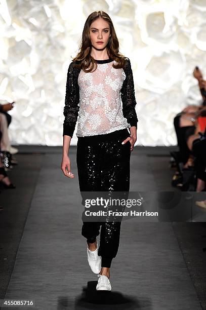 Model walks the runway at the Naeem Khan fashion show during Mercedes-Benz Fashion Week Spring 2015 at The Theatre at Lincoln Center on September 9,...