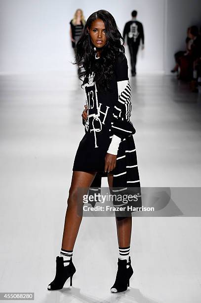 Model walks the runway at the Zang Toi fashion show during Mercedes-Benz Fashion Week Spring 2015 at Lincoln Center on September 9, 2014 in New York...