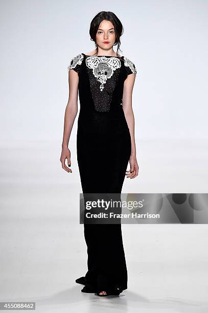 Model walks the runway at the Zang Toi fashion show during Mercedes-Benz Fashion Week Spring 2015 at Lincoln Center on September 9, 2014 in New York...