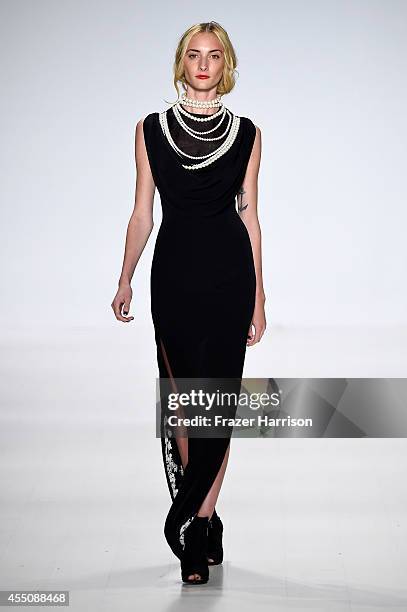 Model walks the runway at the Zang Toi fashion show during Mercedes-Benz Fashion Week Spring 2015 at Lincoln Center on September 9, 2014 in New York...