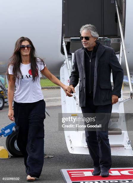 Italian singer, Andrea Bocelli arrives with his wife Veronica Berti at the Auckland International Airport on September 10, 2014 in Auckland, New...