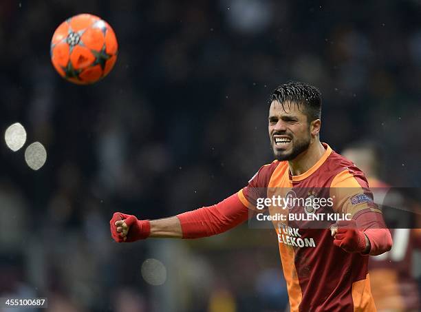 Galatasaray's Gokhan Zan celebrates after his team won the UEFA Champions League group B football match against Juventus at the TT Arena in Istanbul...