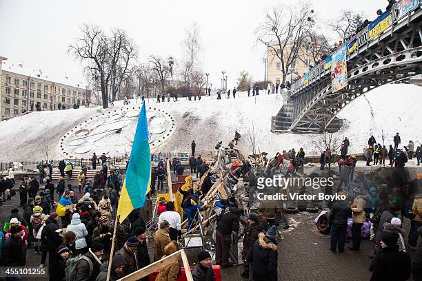 Protesters rebuild barricades after authorities launched an early morning intervention to partially clear Maidan Square from anti government...