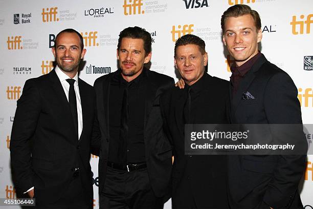 Producer Zev Foreman, actor Ethan Hawke, director Andrew Niccol, and actor Jake Abel arrive at the "Good Kill" Premiere during the 2014 Toronto...