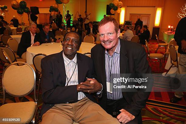 Former Harlem Globetrotter standout Meadowlark Lemon andNational Football League star Ted Hendricks attend the March Of Dimes celebrity casino party...