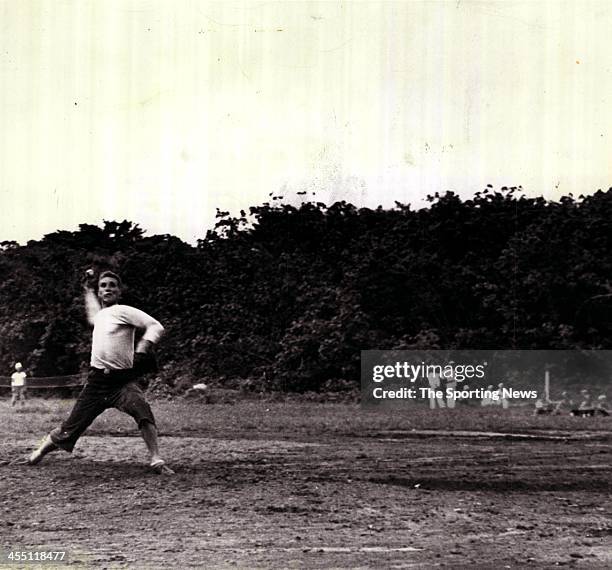 Chief Naval Petty Officer Bob Feller throws a pitch as he plays in a baseball game with fellow Navy serviceman circa 1944. Now Chief specialist in...