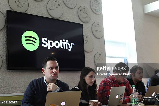 Social media bloggers listen as Spotify CEO Daniel Ek announces that the online streaming music service will expand to 20 new markets around the...